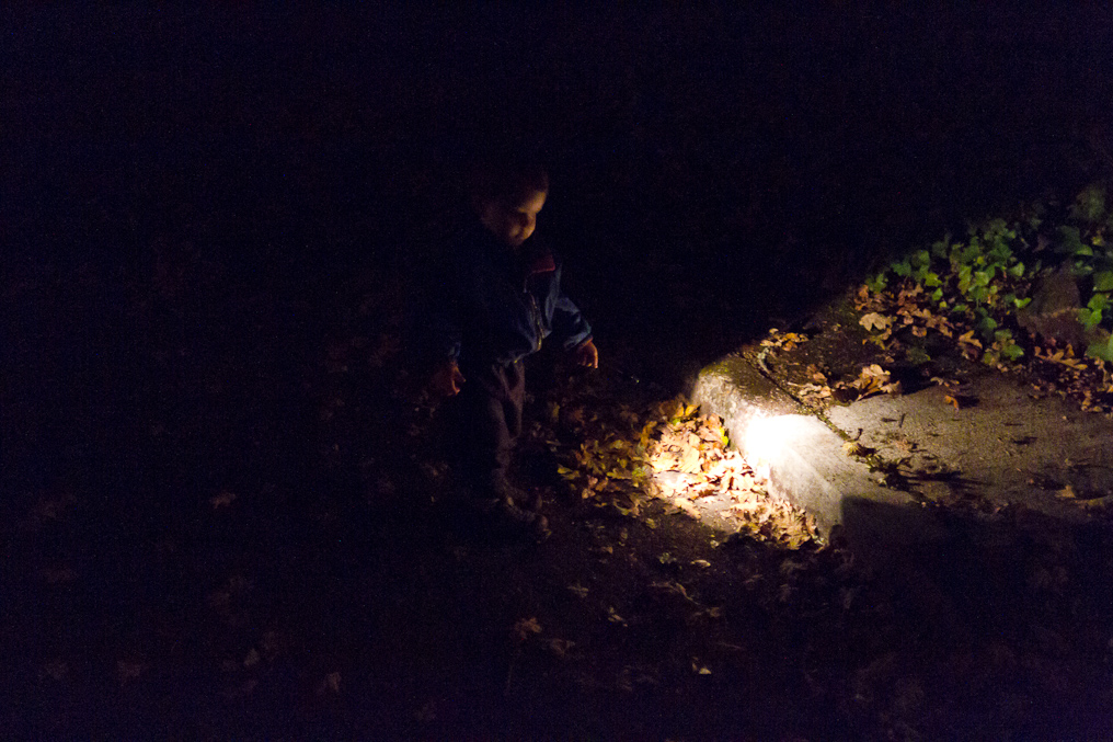 October 14, 2010 - A night time walk with light. Peter is checking out the rain drains (