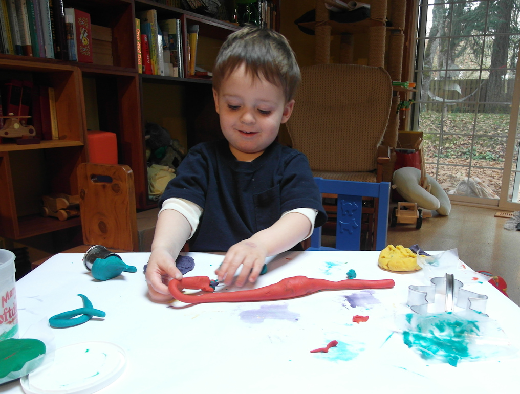 November 06, 2010 - Feeding the Playdoh snake...